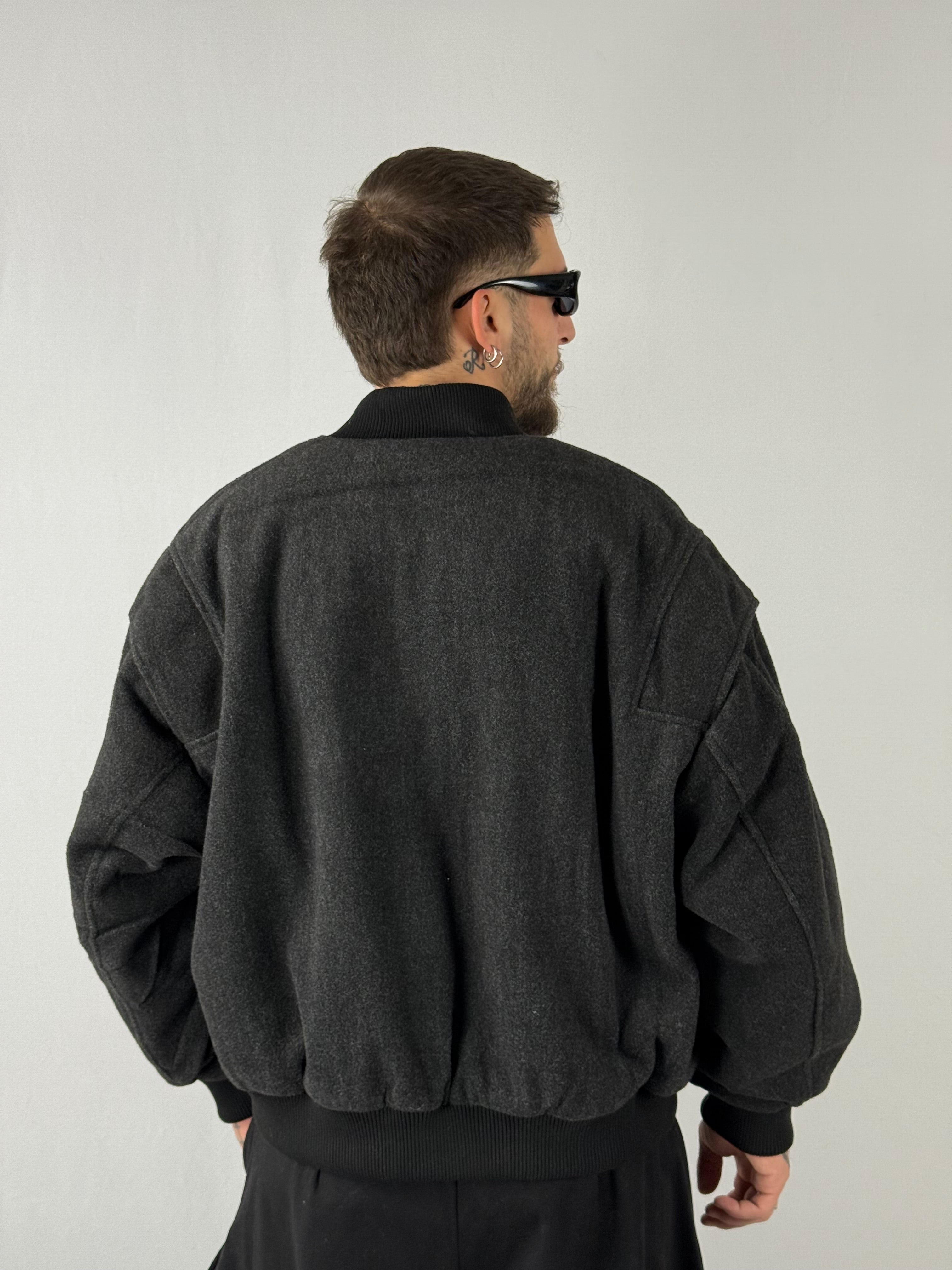 Bomber over dark grey