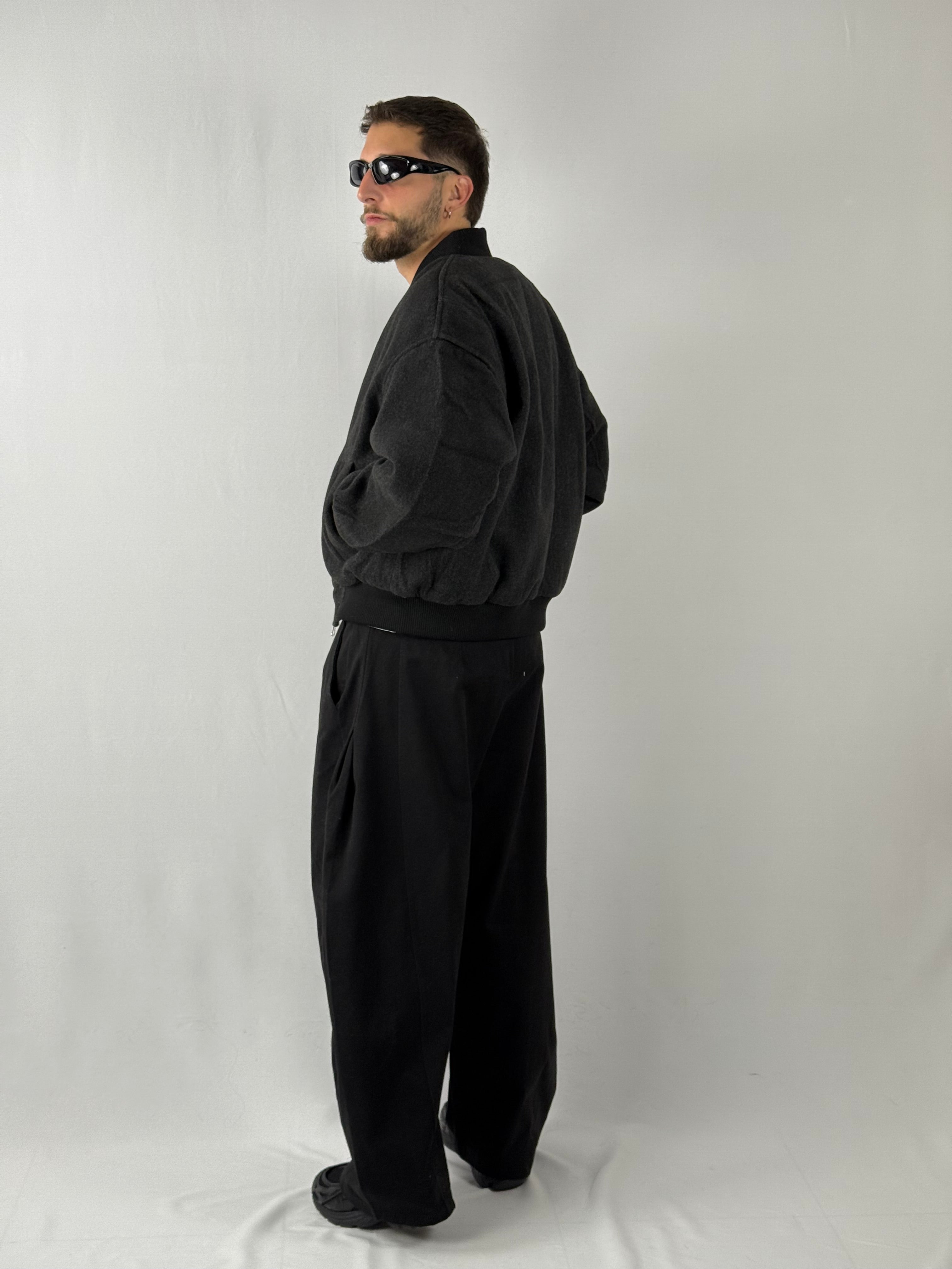 Bomber over dark grey