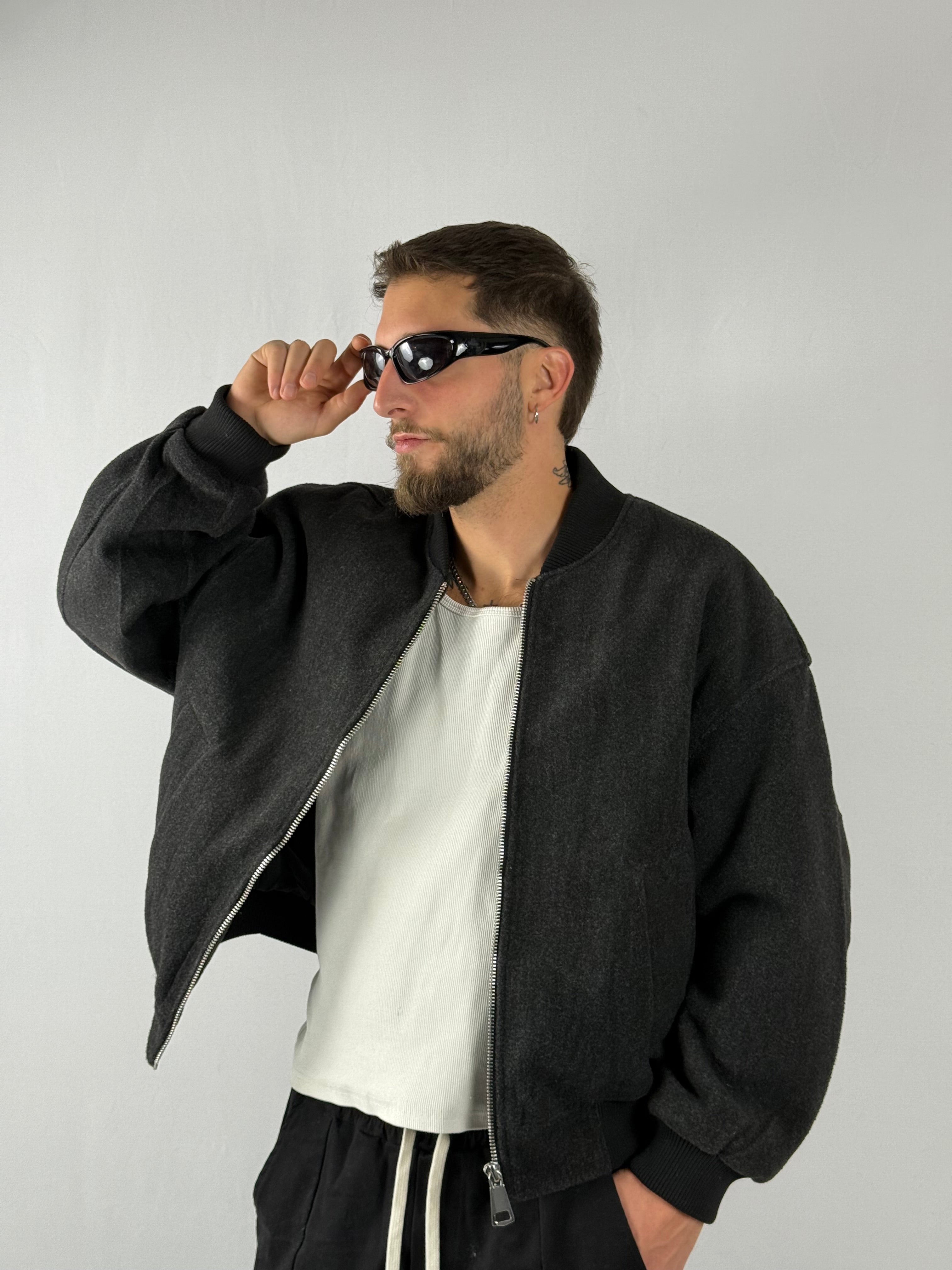 Bomber over dark grey